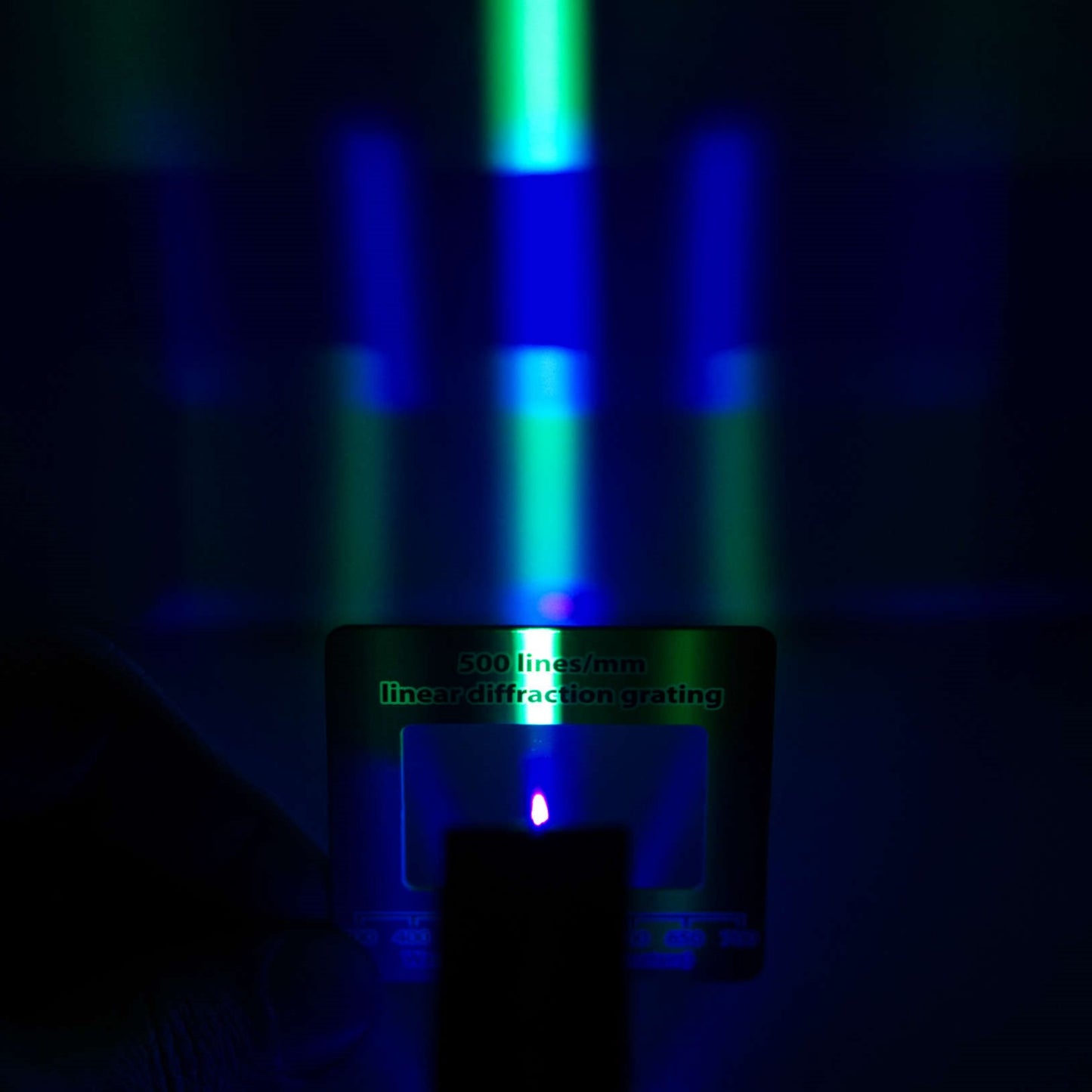 classroom diffraction experiment using LED LIght Blox in green and blue from Laser Classroom with diffraction grating lines