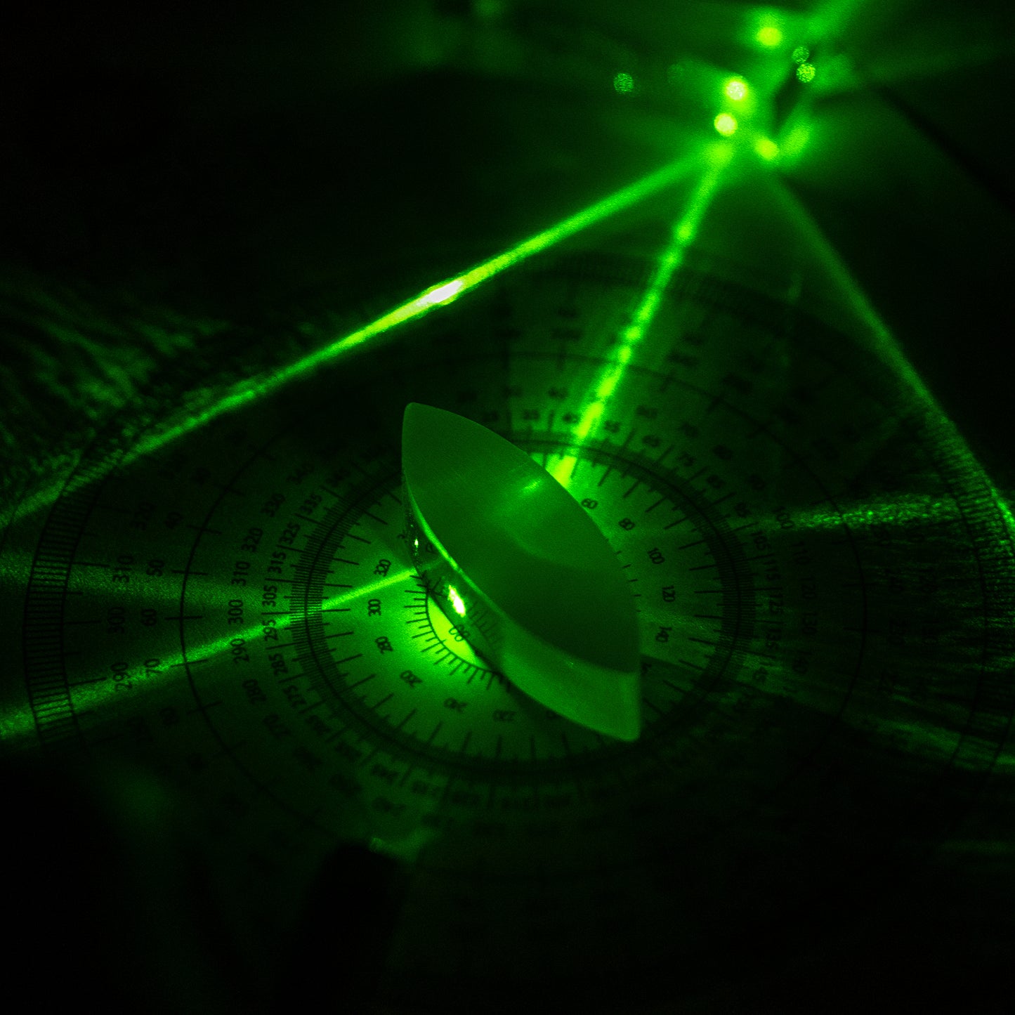 red and green laser pointer for classroom optical lens experiments on protractor and convex lens